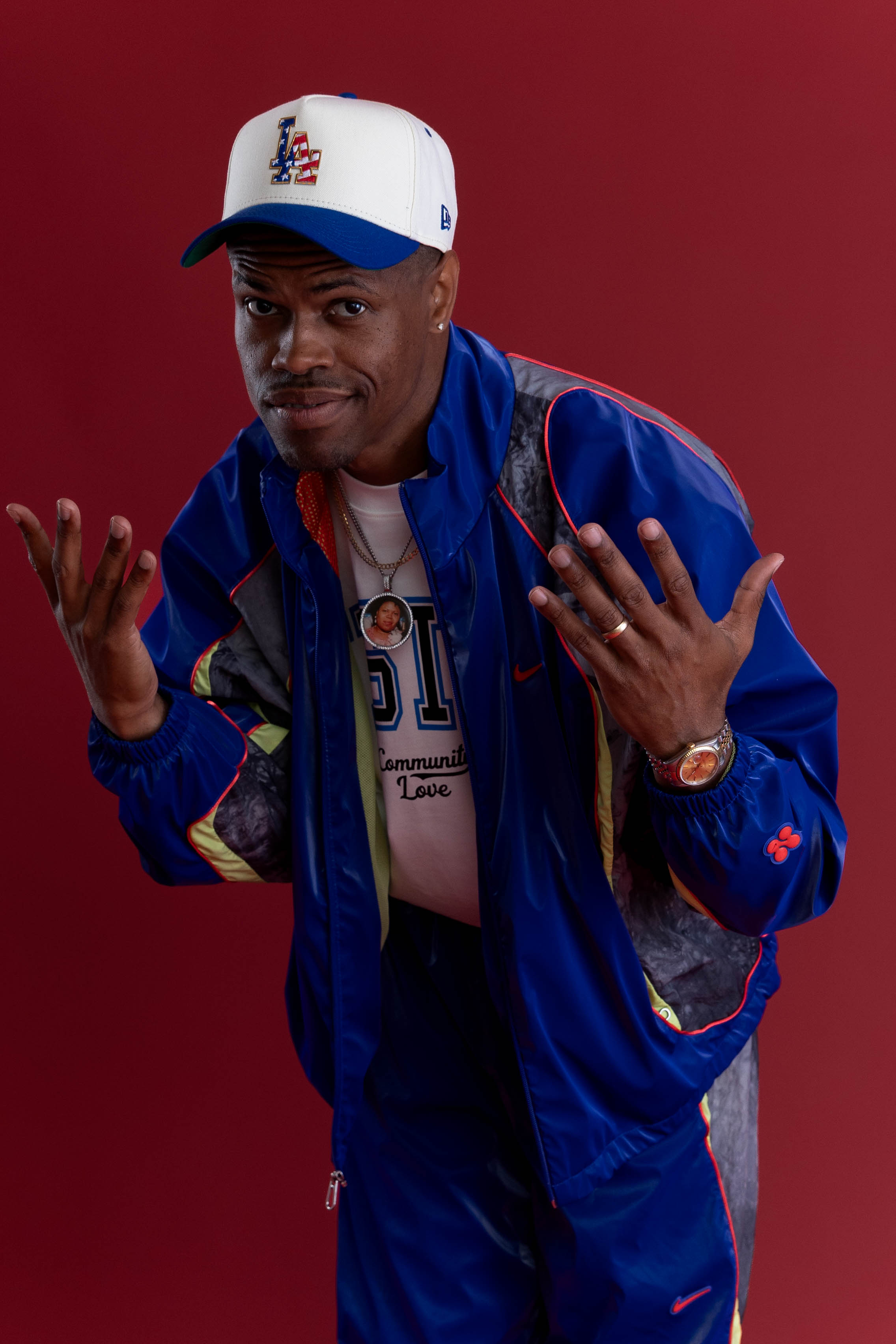 Phil Wright in a blue tracksuit and cap